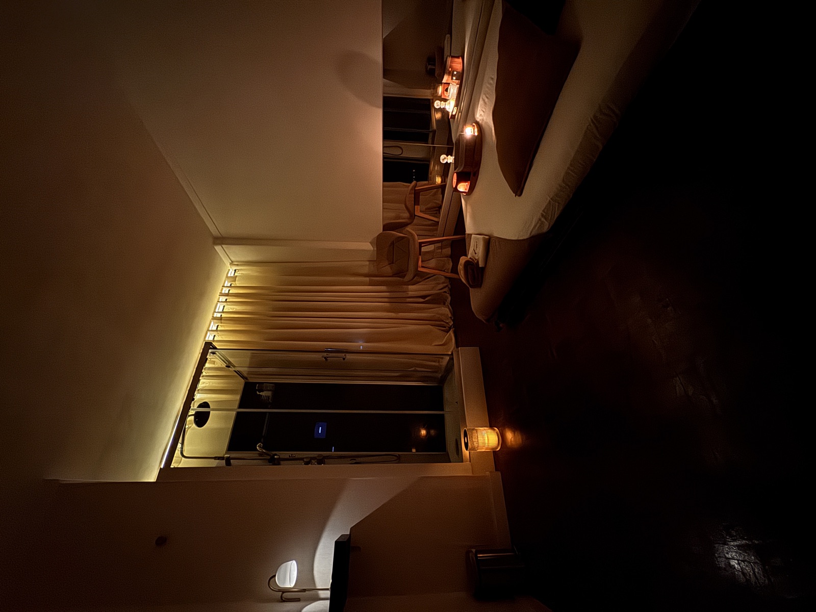 Massage room with shower and candlelight at The Tantric Flow in Lisbon